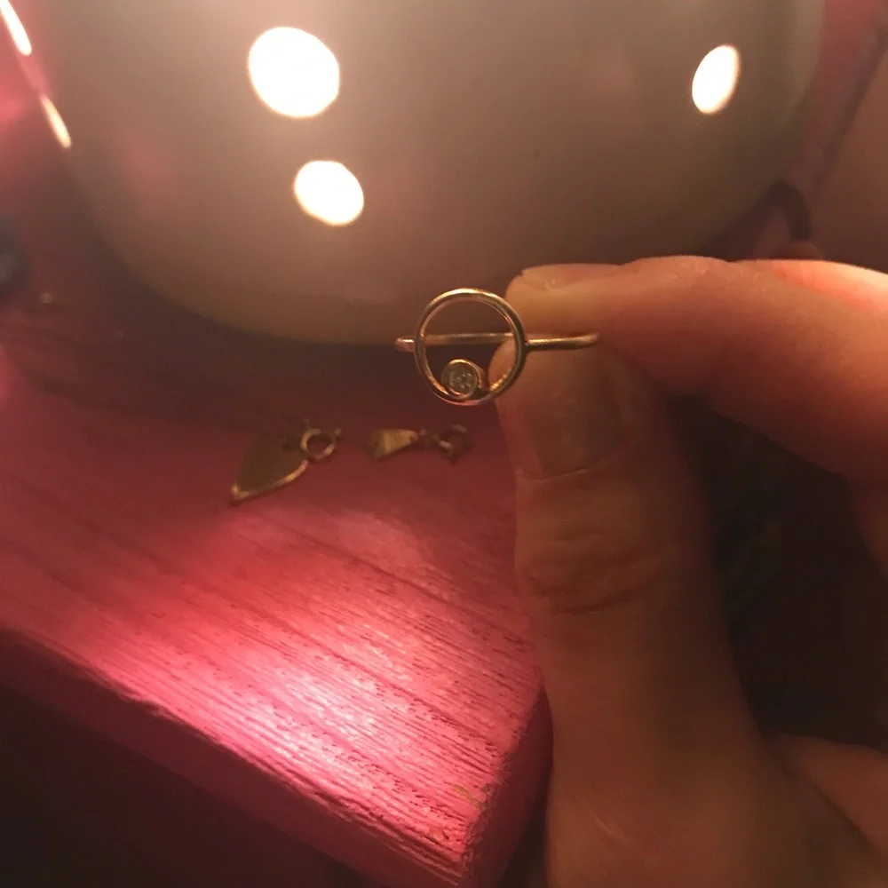 Elegant Gold Ring with Diamond Accent